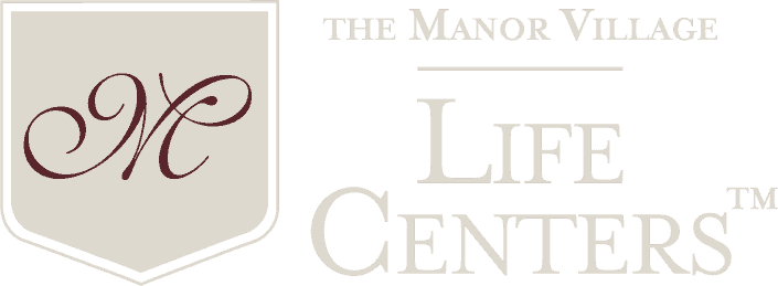 The Manor Village at Desert Ridge logo